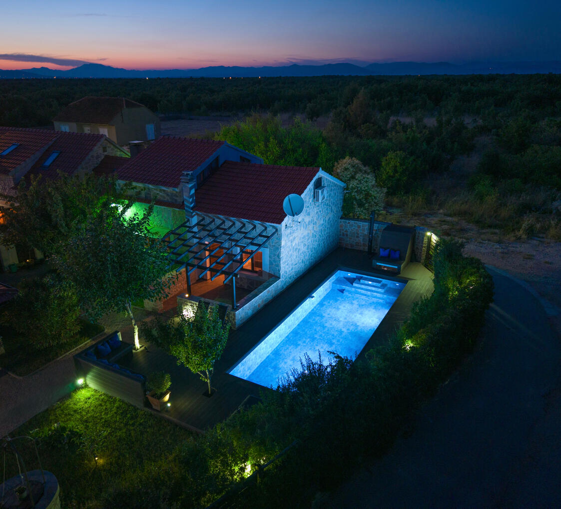 Evening view of the property, highlighting its remote location Evening view of the property, highlighting its remote location