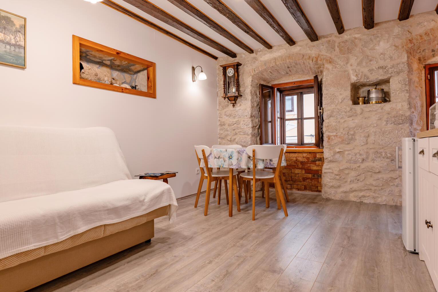 Living room with natural stone wall Living room with natural stone wall