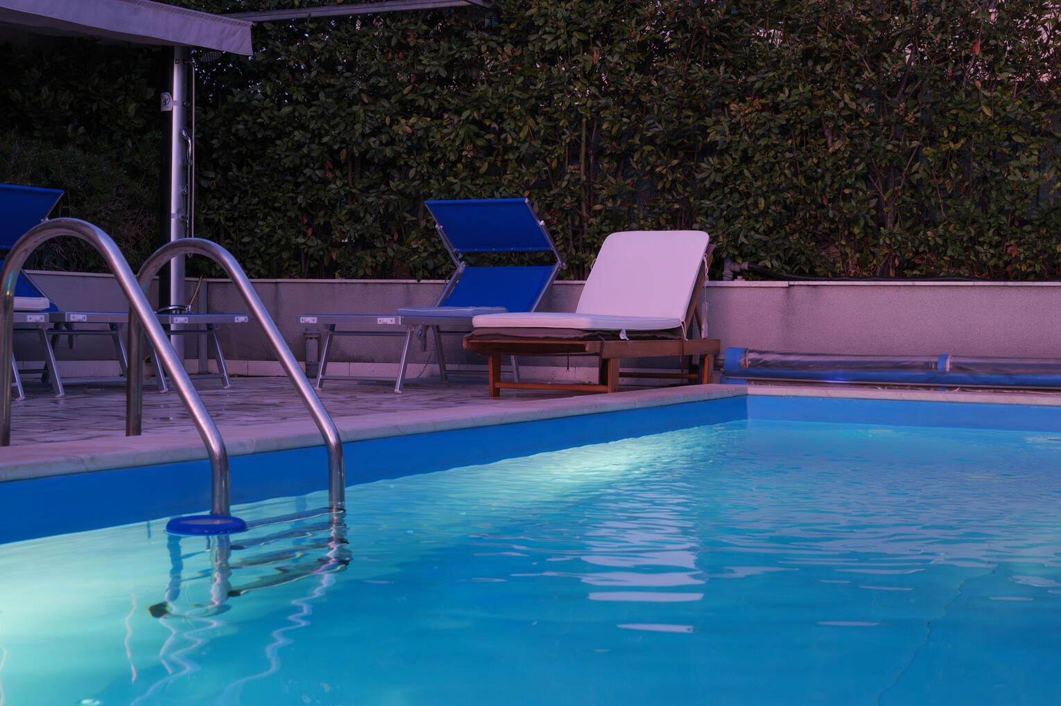 Poolside at sunset Poolside at sunset